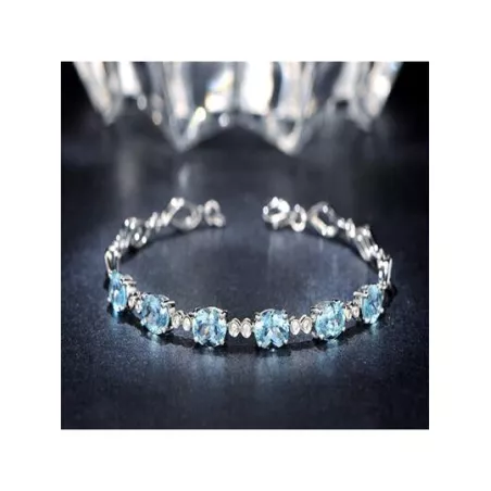 Pulsera decorada con circonitas cúbicas azul claro de 1 pieza