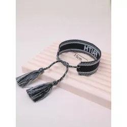 Pulsera con bordado de letra con diseño de fleco