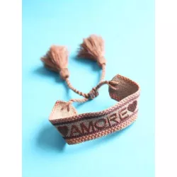 Pulsera con bordado de letra con diseño de fleco