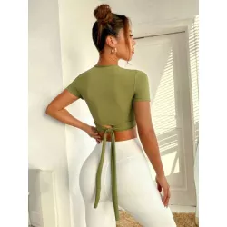 Camiseta deportiva crop unicolor cruzado