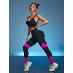 Conjunto deportivo de color combinado de espalda con tira cruzada