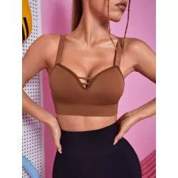 Top deportivo crop con tira cruzada delantera