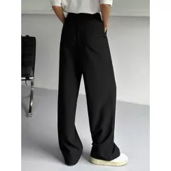 Pantalones de traje unicolor con fruncido