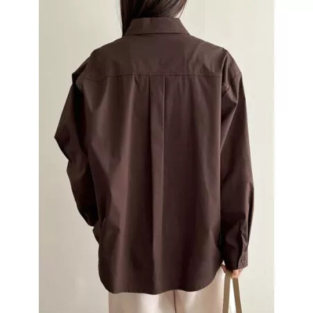 Camisa amplia unicolor de hombros caídos con botón