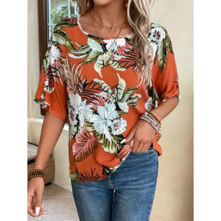 Blusa con estampado tropical de manga murciélago