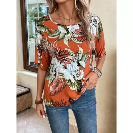 Blusa con estampado tropical de manga murciélago