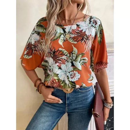 Blusa con estampado tropical de manga murciélago